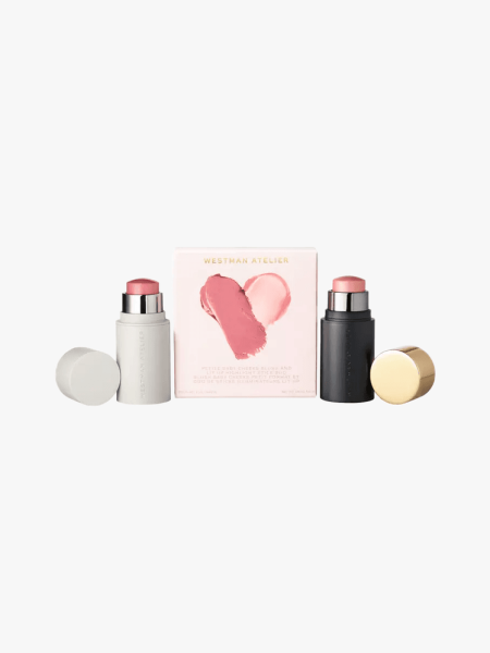 Westman Atelier Petite Baby Cheeks Blush & Lit Up Highlight Stick Duo in branded components on a light gray background