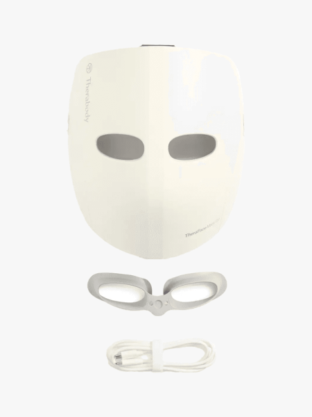 Therabody TheraFace Mask Glo in branded components on a light gray background