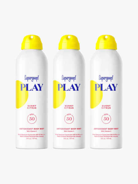 Supergoop Play Antioxidant Body Mist SPF 50 Sunscreen Trio in branded components on a light gray background