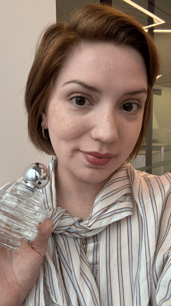 Allure director of social media Kassidy Silva holding the Tory Burch Sublime Eau de Parfum