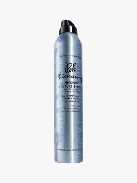 Bumble and bumble Thickening Dryspun Texture Spray in branded component on a light gray background